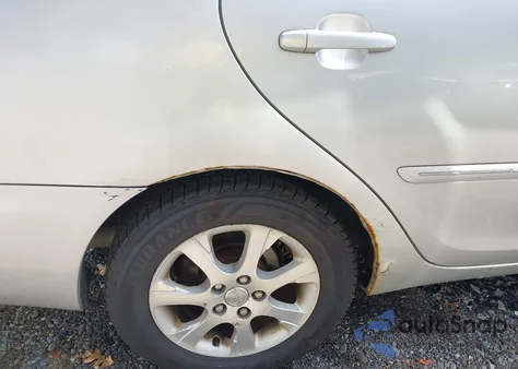 2005 Toyota Camry Le/Xle/Se z USA, uszkodzony, nr VIN 4T1BE30KX5U957227